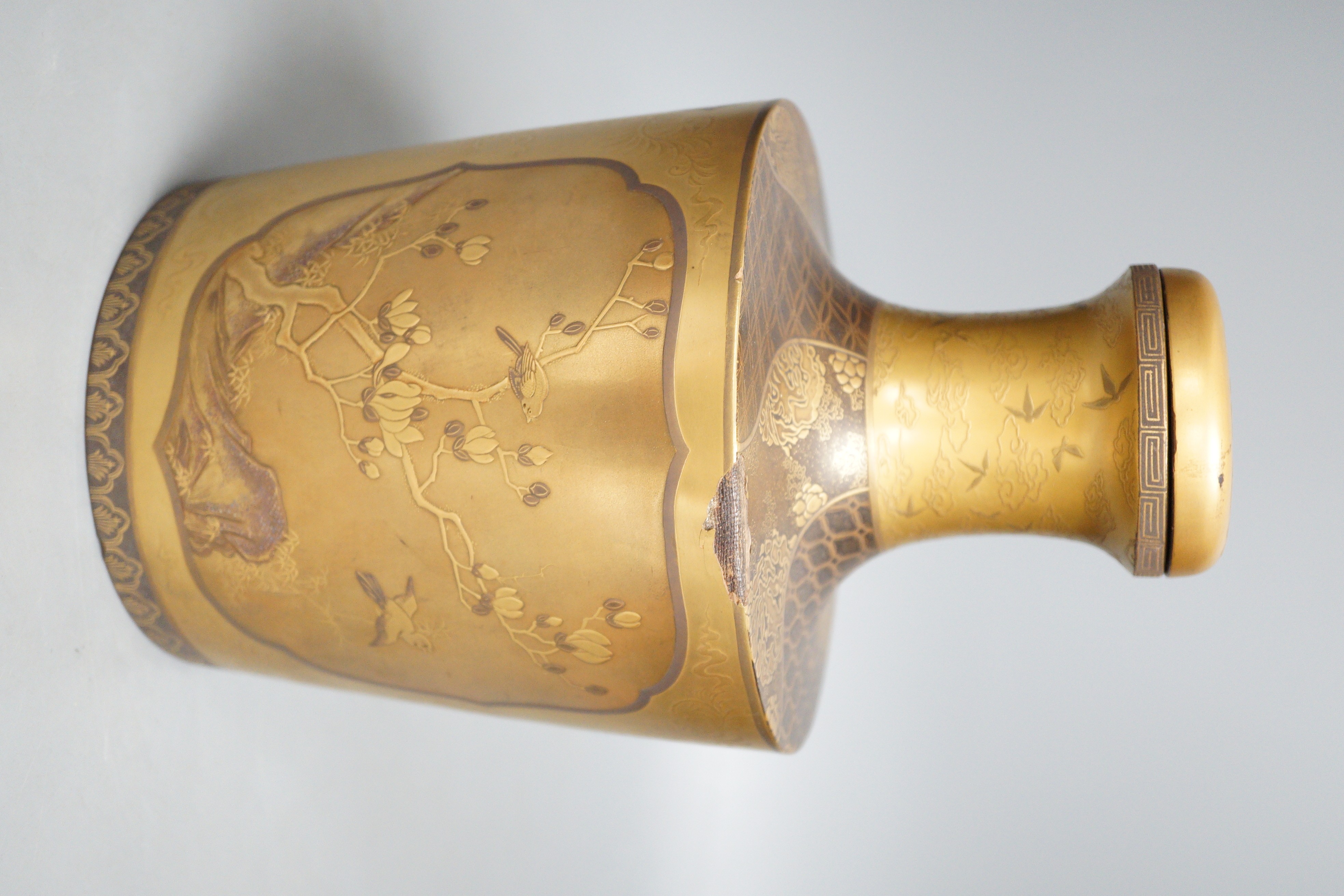A Japanese Meiji period maki-e lacquer sake flask and stopper (tokkuri), 24cm tall
